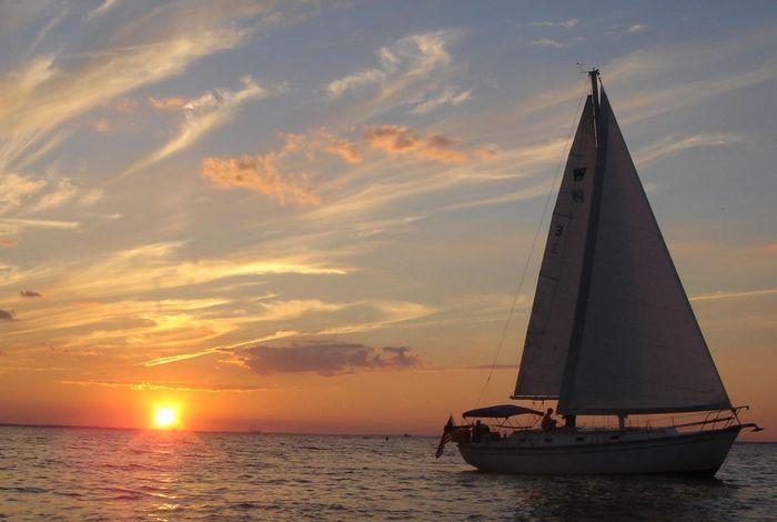 sunset sail boat